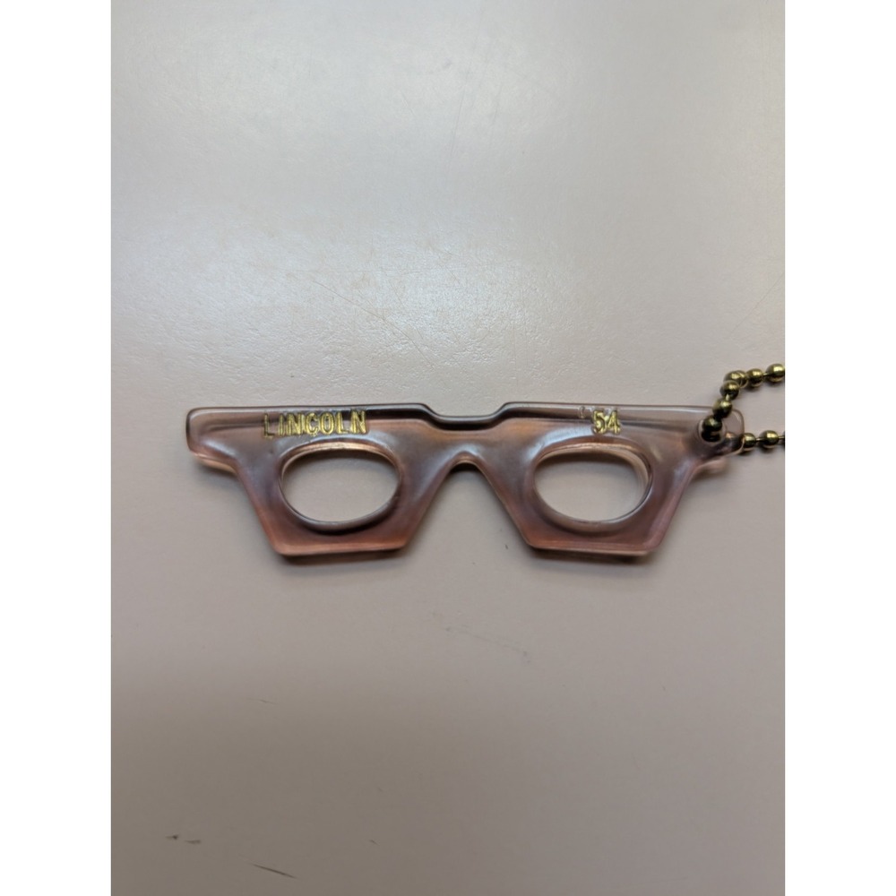 Vtg Lincoln 54' Advertising Keychain Glasses Celluloid Plastics Smoky Pink